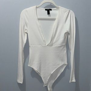 Long sleeve Deep V Bodysuit White. Never worn